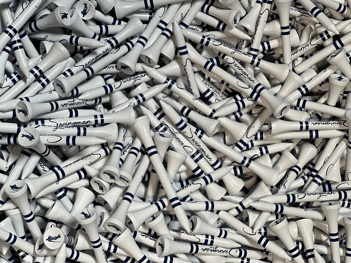 Pile of white wooden golf tees with depth lines