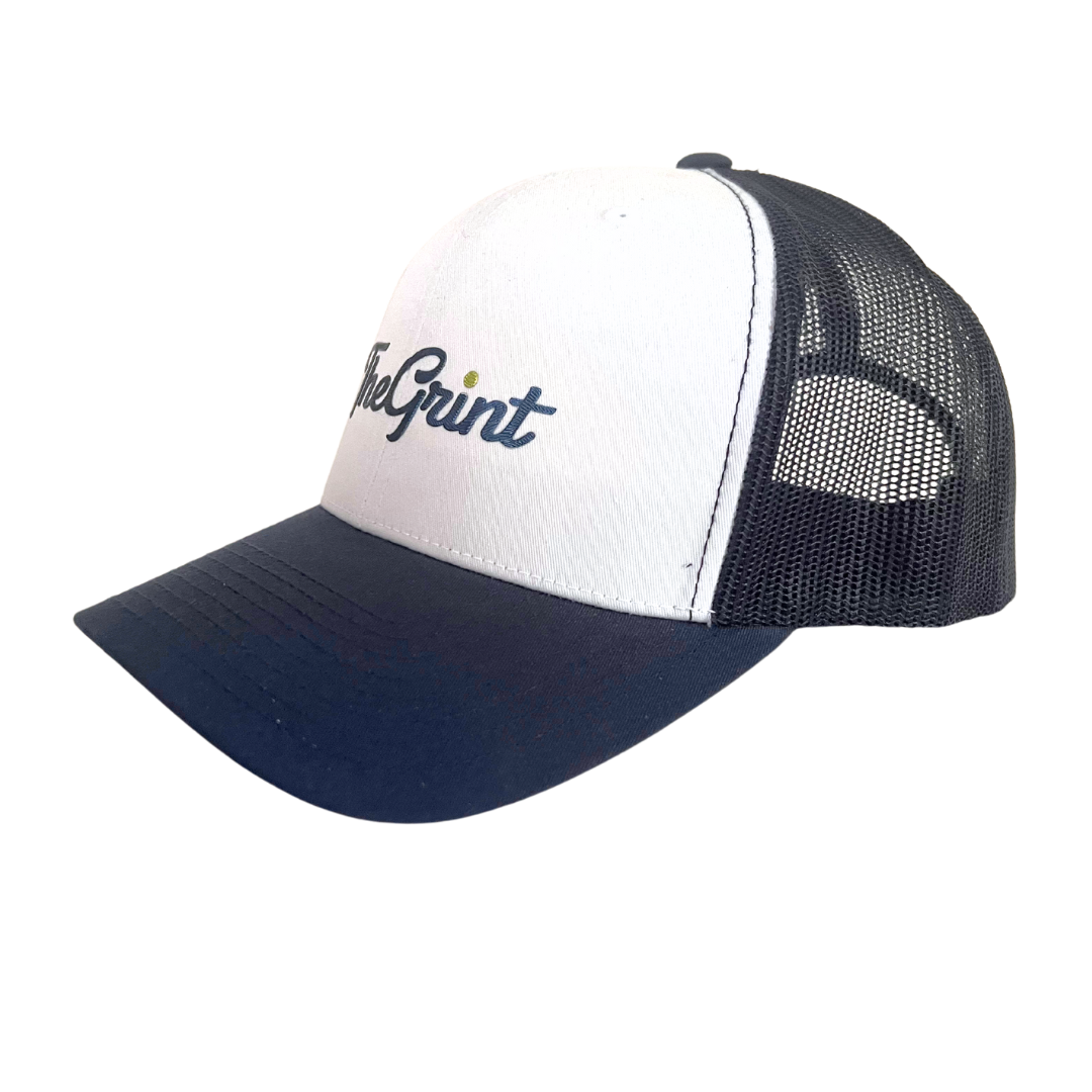 White and navy TheGrint script logo trucker snapback